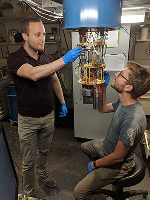 Serge Rosenblum (left) and Philip Reinhold, co-lead authors of a new study on a fault-tolerant quantum error correction system.