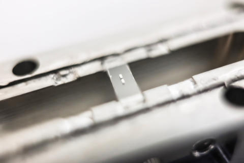 An artificial atom made out of an aluminum circuit on sapphire was used to test quantum trajectory theory.
