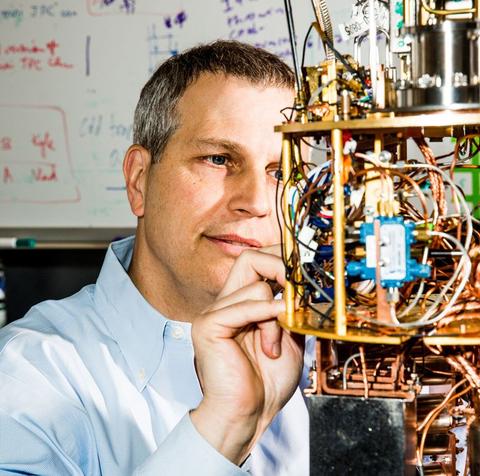 Robert Schoelkopf, at Yale University in New Haven, Connecticut, with a refrigerating device that cools superconducting qubits to just above absolute zero.Credit: Roger Kisby/Redux/eyevine