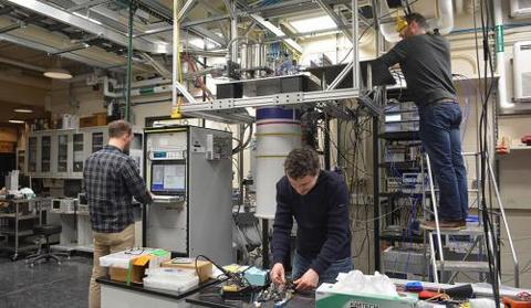 A new grant will help fund cutting edge research and additional electronics and cooling equipment used by Yale researchers in quantum science. (Photo courtesy of the Yale Quantum Institute) Researchers working on the dilution fridge